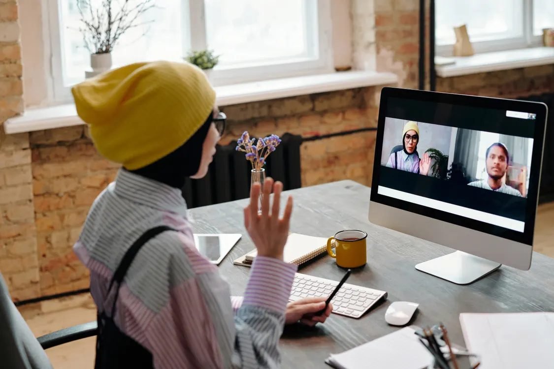 Engineer walking through ROI numbers with a client on a video call